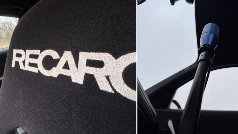 A close-up view of the professional track preparation and engineered details on the BMW 130i for the Nürburgring.